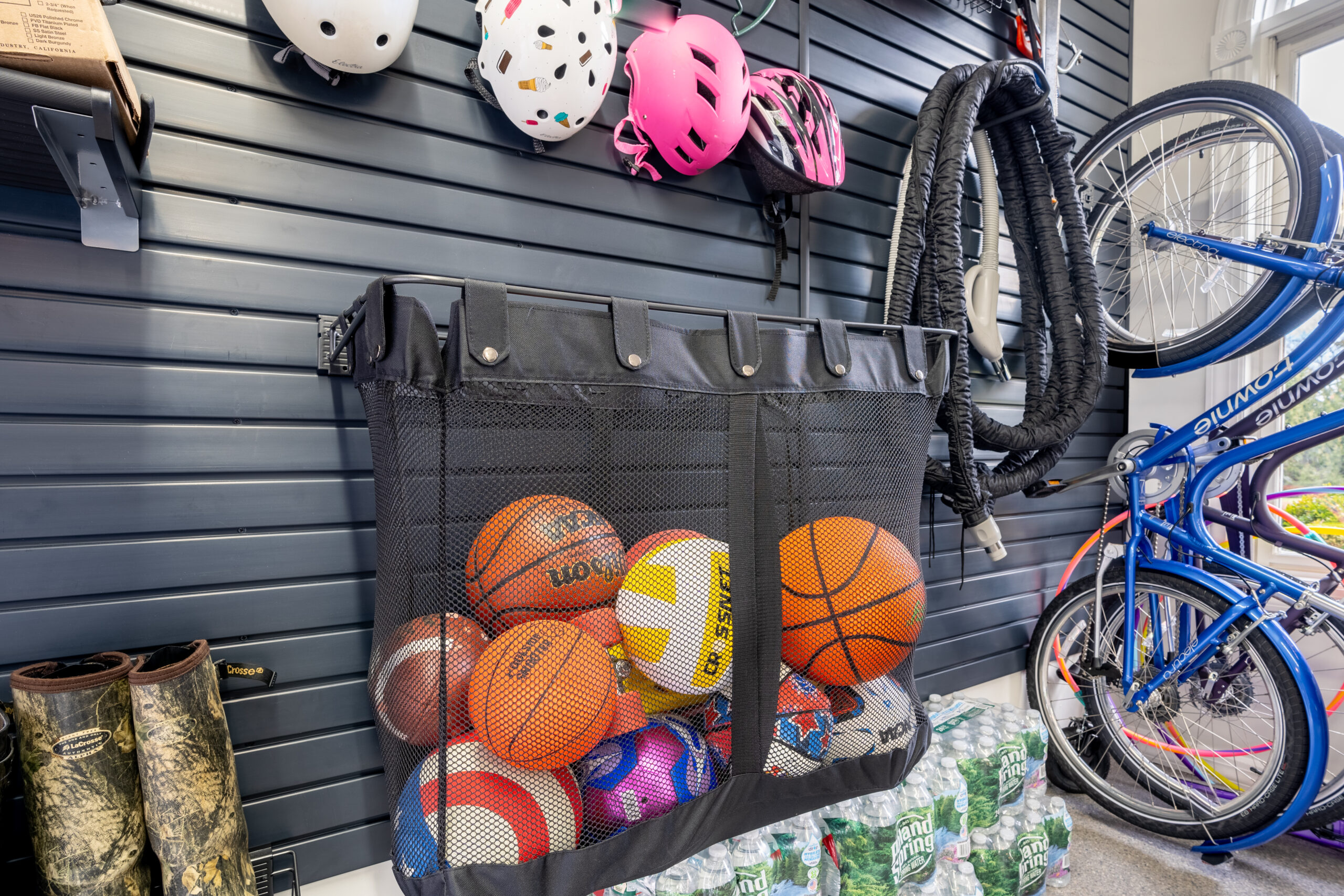 Slatwall storage for custom garage remodeling by PremierGarage of Orange County