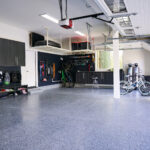 high end garage cabinets with wall storage and coated garage floor in Orange County garage