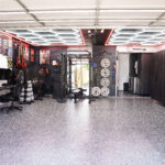 finished garage remodel with cabinets flooring and usable space