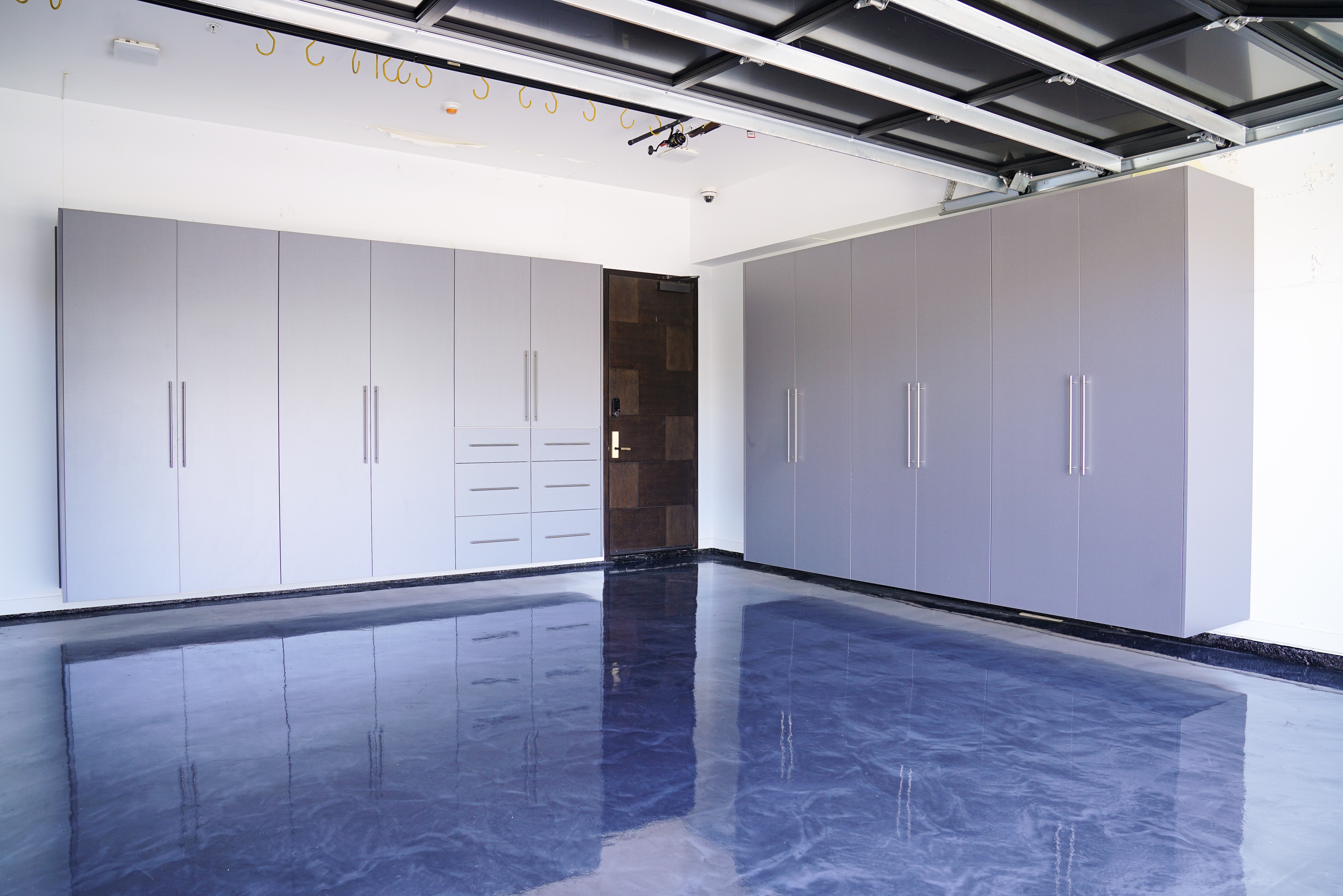 garage remodel with cabinets and flooring for improved buyer appeal