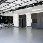 finished garage with wall storage and garage cabinets