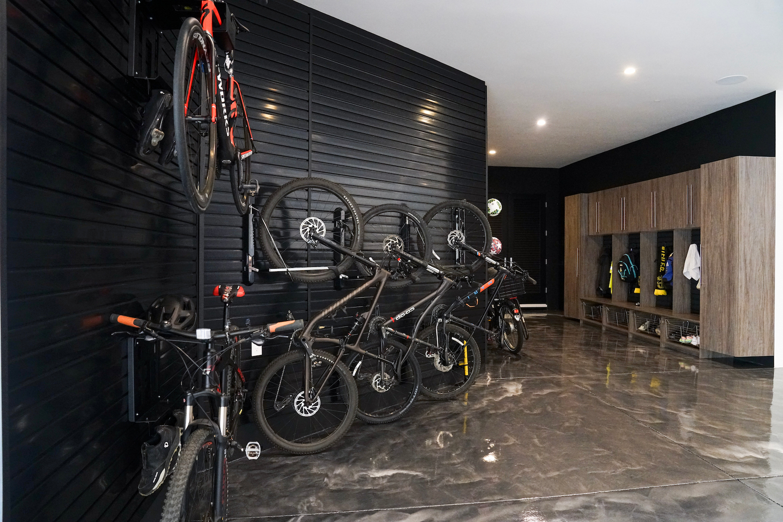 garage organization system with wall storage cabinets and designated zones