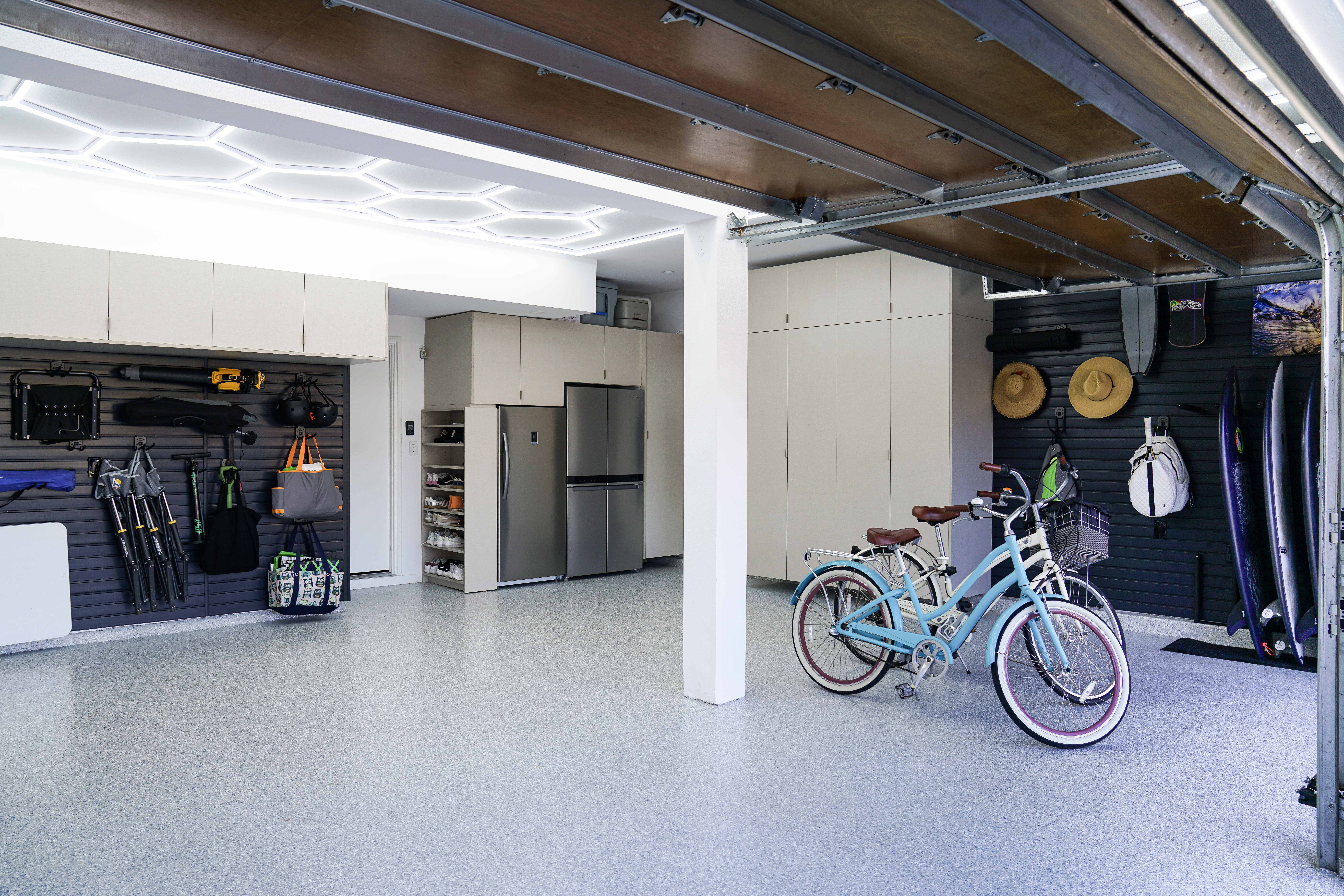 garage storage system with cabinets and wall storage for different items